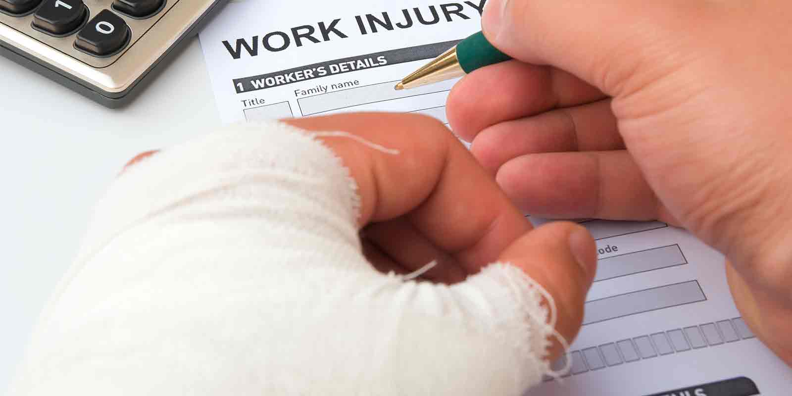 person filling out form for Workers Compensation Insurance
