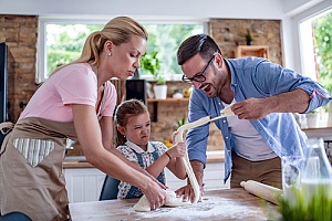 a family baking together at home