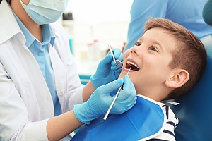 a little boy visiting his dentist