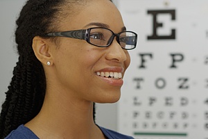 a women with glasses at an eye doctor