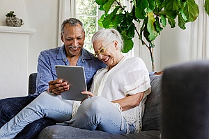 a couple discussing whole life insurance plans