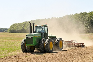 a farm tractor covered with farm and ranch insurance