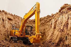 an excavator protected from equipment breakdown with contractor insurance