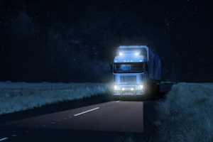 commercial truck driving at night
