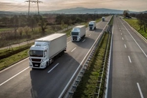 multiple trucks in freeway