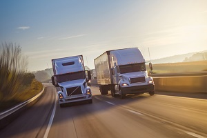 two semitrucks on the road