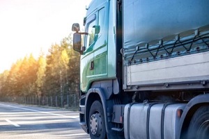 green truck in highway