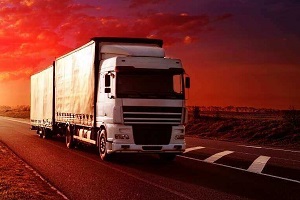 truck on a highway with red background