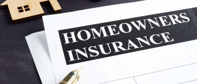 homeowners insurance policy and model of home