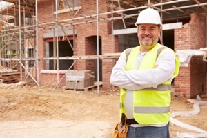 portrait of construction worker on building site
