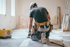 home builder doing flooring work