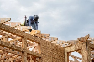 new residential home construction in framing stage
