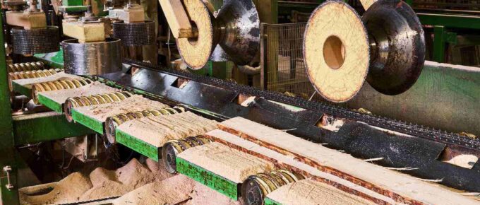 fragment of sawmill machinery inside a modern lumber mill