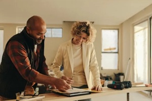 home builder with a female client
