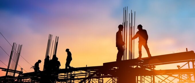silhouette engineer standing orders for construction crews